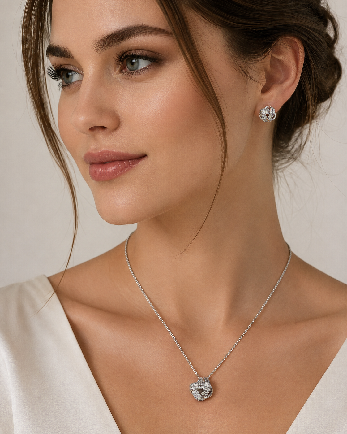 ELEGANT BOW NECKLACE AND CUBIC ZIRCONIA EARRINGS