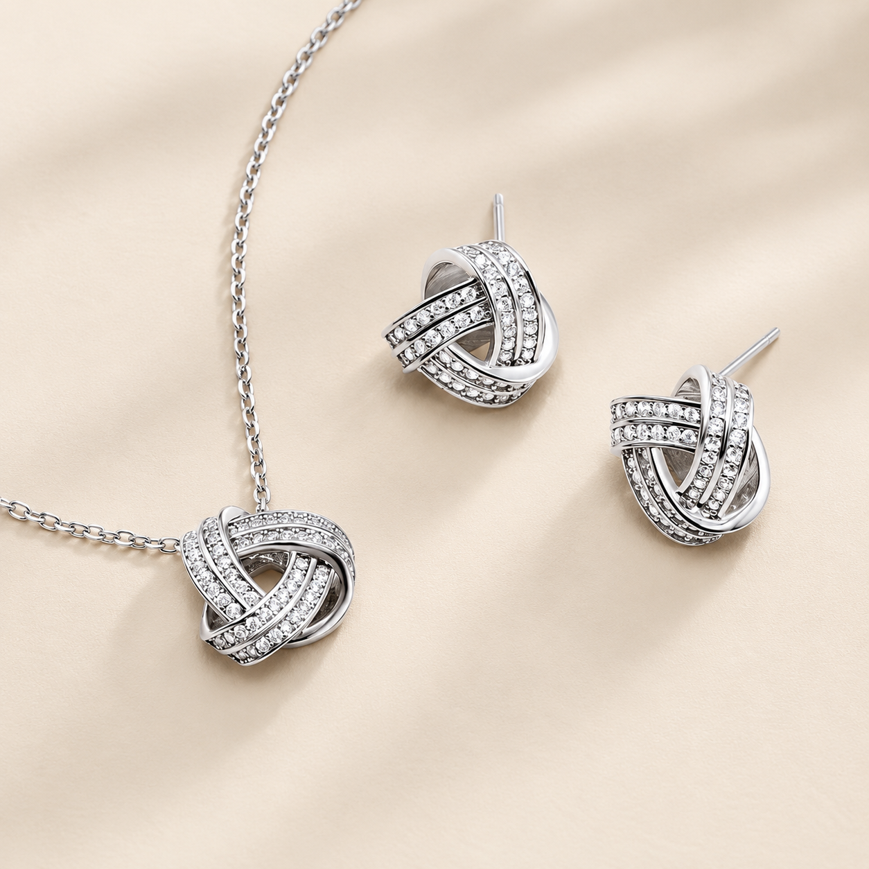 ELEGANT BOW NECKLACE AND CUBIC ZIRCONIA EARRINGS